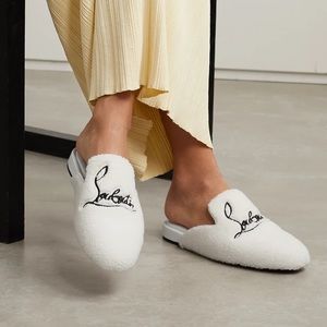 Authenticated louboutin logo faux fur mules